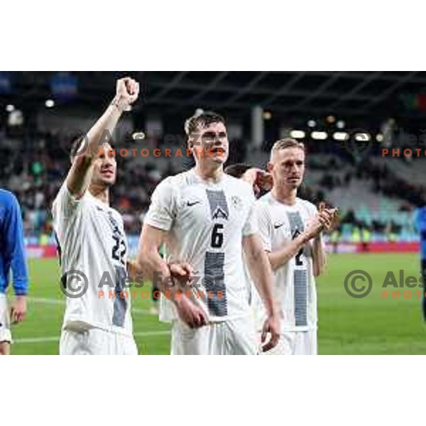 Adam Gnezda Cerin, Jaka Bijol, and Zan Karnicnik salute to the fans after a friendly football match between Slovenia and Portugal in Ljubljana, Slovenia on March 26, 2024