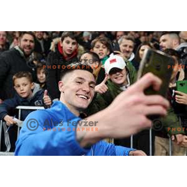Benjamin Sesko poses for a selfie with his fans after friendly football match between Slovenia and Portugal in Ljubljana, Slovenia on March 26, 2024