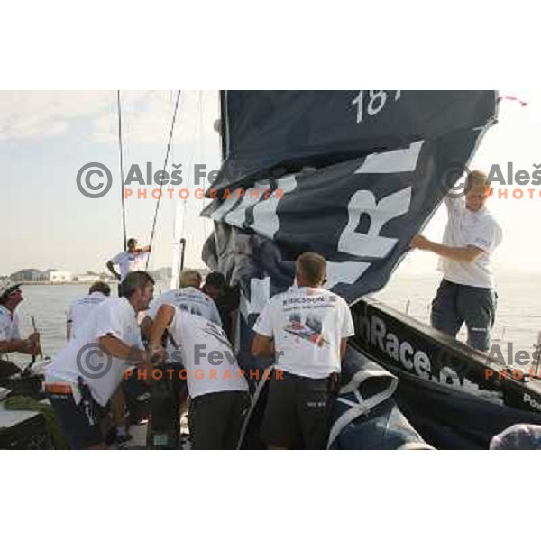 Ericsson Racing team checking main sail during morning practise sail