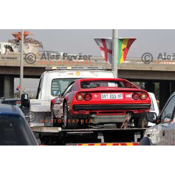 Truck with Ferrari on motorway near Sandton, Johannesburg in South Africa on June 10th 2010 