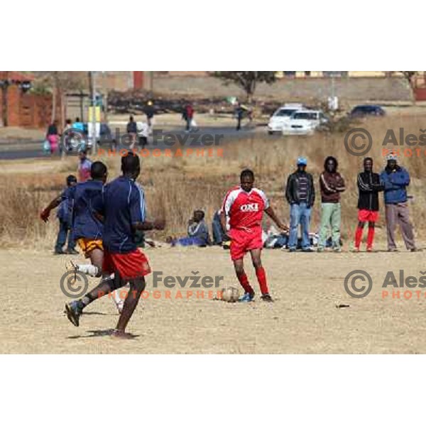Boys playing football in Soweto on June 20th , 2010 FIFA World Cup South Africa. 