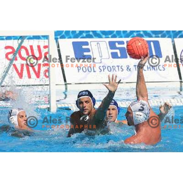 Tomaz Mihelcic tries to defend against Tjerk Kramer while Robert van der Hoogenband (9) and Matej Nastran watch the action during Waterpolo match between Slovenia and The Netherlands at European Championship in Belgrade, Serbia on September 7, 2006 