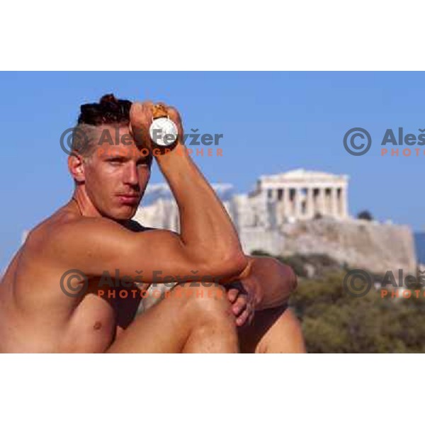 Luka Spik of Slovenia, silver medalist in rowing at Summer Olympic Games in Athens, Greece , August 2004 pictured in front of Acropolis 