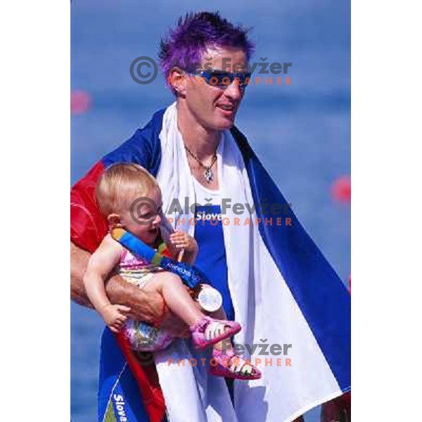 Iztok Cop of Slovenia, silver medalist in rowing at Summer Olympic Games in Athens, Greece , August 2004 pictured with his daughter Ruby 