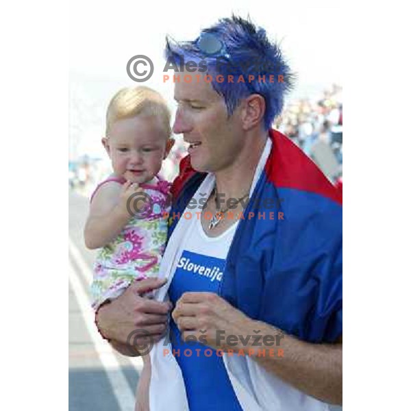 Iztok Cop of Slovenia, silver medalist in rowing at Summer Olympic Games in Athens, Greece , August 2004 with daughter Ruby 