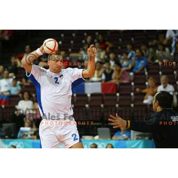 Miladin Kozlina in action during match Slovenia-Egypt at handball tournament at Summer Olympic Games Athens 2004, Greece 