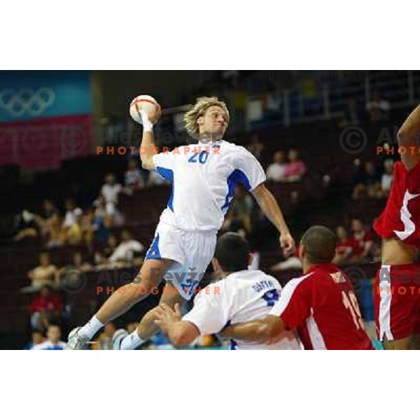 Luka Zvizej in action during match Slovenia-Egypt at handball tournament at Summer Olympic Games Athens 2004, Greece 
