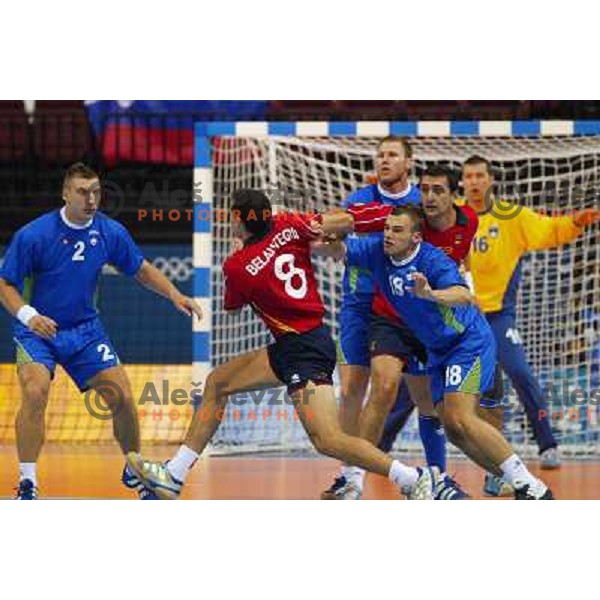 Miladin Kozlina, Ales Pajovic and Uros Zorman of Slovenia in action during Handball tournament at Summer Olympic Games Athens 2004, Greece. Slovenia played with Spain on August 20, 2004 