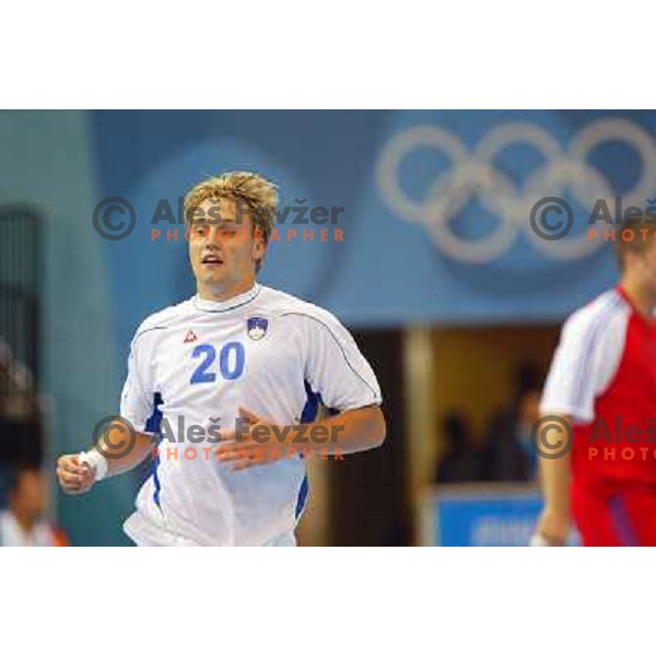 Luka Zvizej of Slovenia in action during Handball tournament at Summer Olympic Games Athens 2004, Greece. Slovenia played with Russia on August 13, 2004 