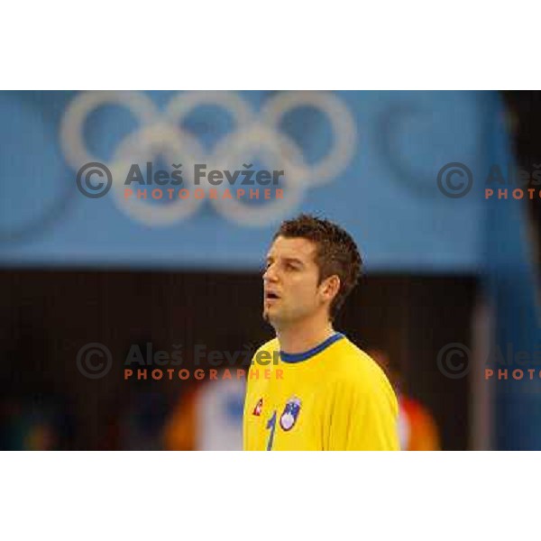 Dusan Podpecan of Slovenia in action during Handball tournament at Summer Olympic Games Athens 2004, Greece. Slovenia played with Russia on August 13, 2004 