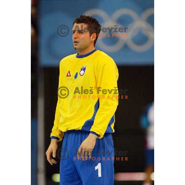 Dusan Podpecan of Slovenia in action during Handball tournament at Summer Olympic Games Athens 2004, Greece. Slovenia played with Russia on August 13, 2004 