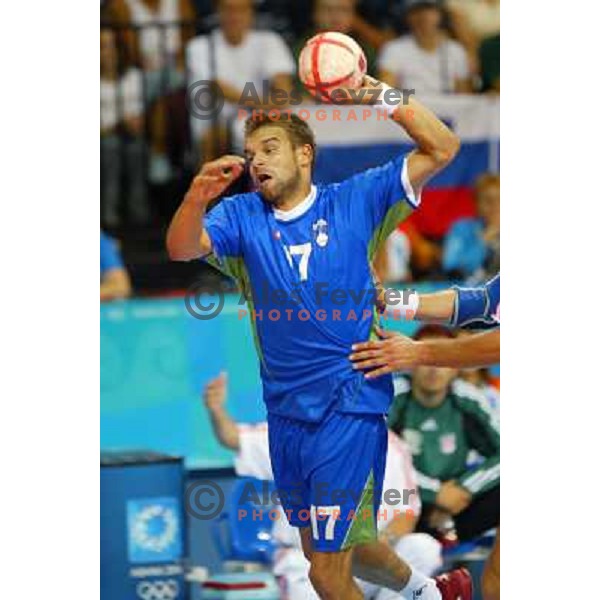 Matjaz Brumen of Slovenia in action during Handball tournament at Summer Olympic Games Athens 2004, Greece. Slovenia played with Croatia on August 15, 2004 