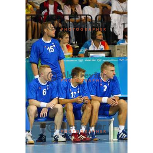 Andrej Kastelic, Matjaz Brumen, Miladin Kozlina, Ales Pajovic of Slovenia in action during Handball tournament at Summer Olympic Games Athens 2004, Greece. Slovenia played with Croatia on August 15, 2004 