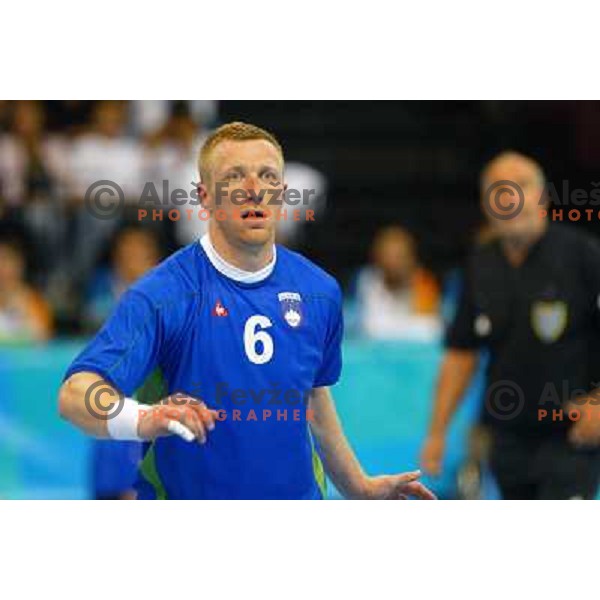 Andrej Kastelic of Slovenia in action during Handball tournament at Summer Olympic Games Athens 2004, Greece. Slovenia played with Croatia on August 15, 2004 