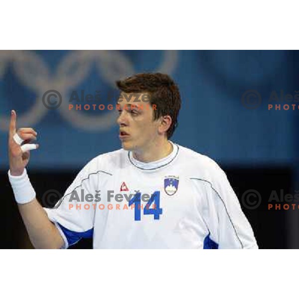 Sergej Rutenka of Slovenia in action during Handball tournament at Summer Olympic Games Athens 2004, Greece. Slovenia played with Iceland on August 18, 2004 