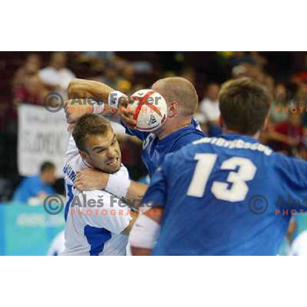 Uros Zorman of Slovenia in action during Handball tournament at Summer Olympic Games Athens 2004, Greece. Slovenia played with Iceland on August 18, 2004 
