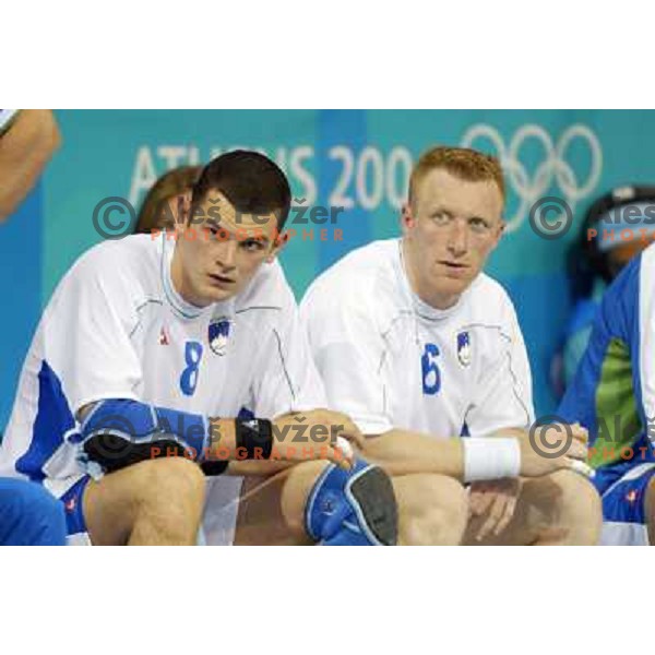 Marko Ostir, Andrej Kastelic of Slovenia in action during Handball tournament at Summer Olympic Games Athens 2004, Greece. Slovenia played with Iceland on August 18, 2004 