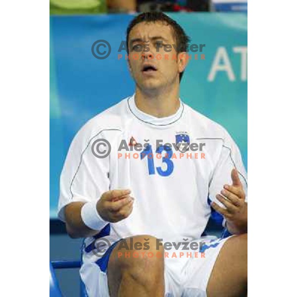 Tomaz Tomsic of Slovenia in action during Handball tournament at Summer Olympic Games Athens 2004, Greece. Slovenia played with Iceland on August 18, 2004 