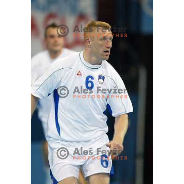 Andrej Kastelic of Slovenia in action during Handball tournament at Summer Olympic Games Athens 2004, Greece. Slovenia played with Iceland on August 18, 2004 