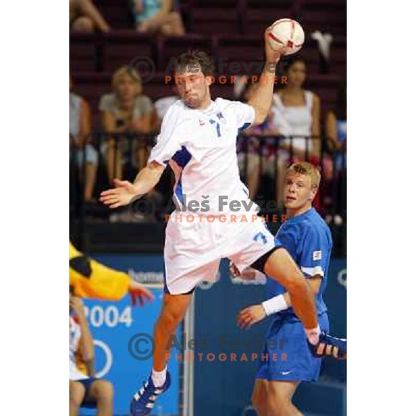 Vid Kavticnik of Slovenia in action during Handball tournament at Summer Olympic Games Athens 2004, Greece. Slovenia played with Iceland on August 18, 2004 