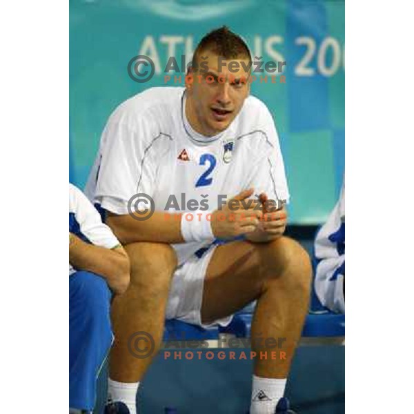 Miladin Kozlina of Slovenia in action during Handball tournament at Summer Olympic Games Athens 2004, Greece. Slovenia played with Iceland on August 18, 2004 