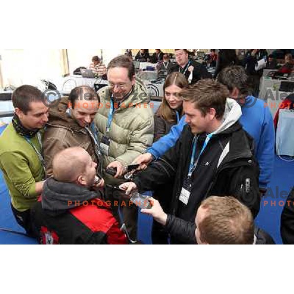 Journalists in the press center talking to Eddie "the Eagle" Edwards, british ski jumper who competed at 1988 Winter Olympic games visited with his family FIS World Cup Ski Jumping Final in Planica, Slovenia on March 20, 2011 
